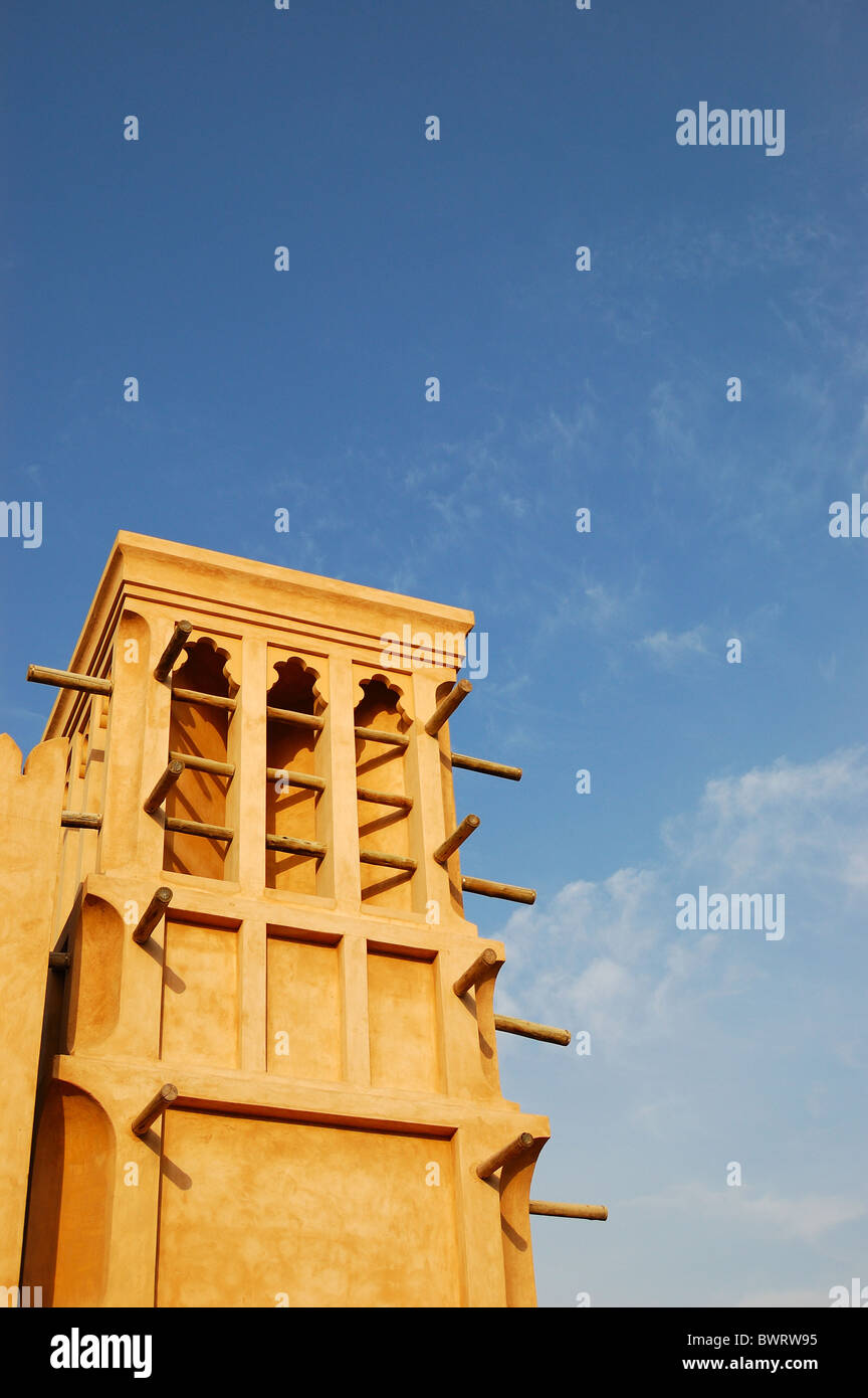 Arabic wind tower during sunset, Dubai, UAE Stock Photo