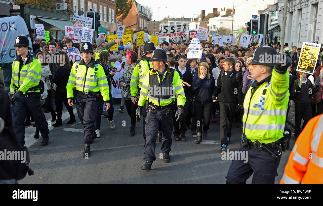 A heavily policed student protest march through Brighton UK demonstrating against proposed cuts in education Stock Photo