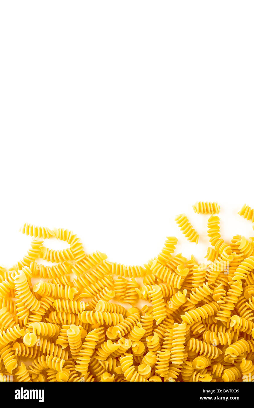 Delicious spirelli pasta white background with copy space Stock Photo - Alamy