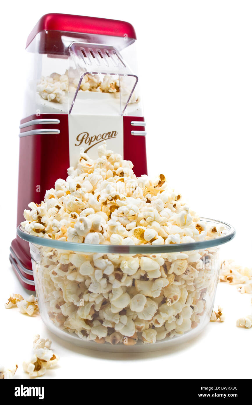 https://c8.alamy.com/comp/BWRX9C/popcorn-machine-with-popcorn-over-white-background-BWRX9C.jpg