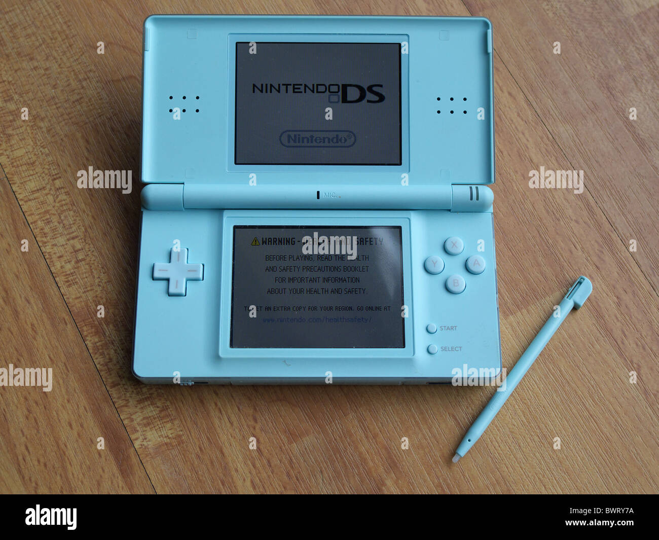 Nintendo DS Lite Handheld Games Console Stock Photo