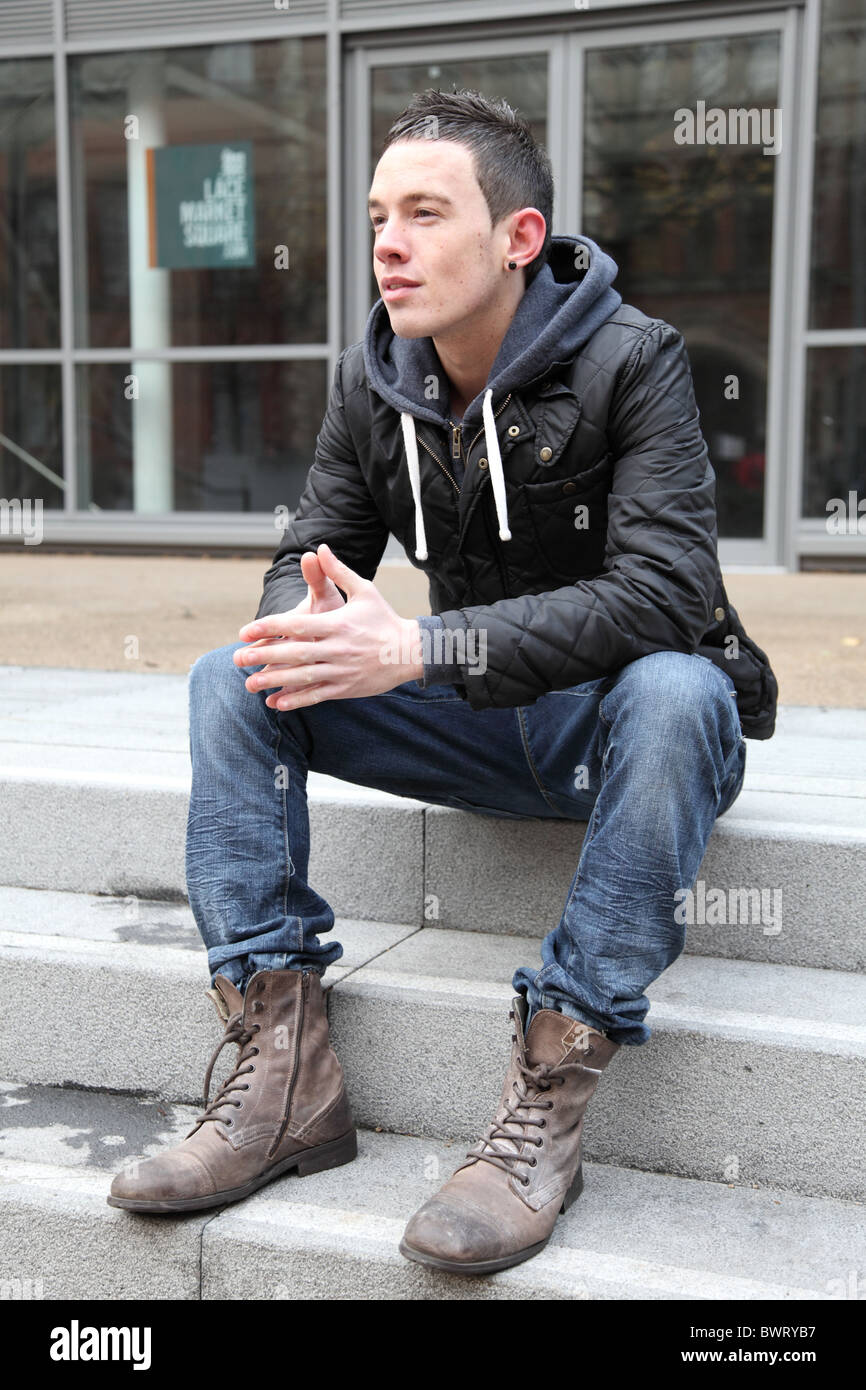 Man wearing denim jeans boots hi-res stock photography and images - Alamy