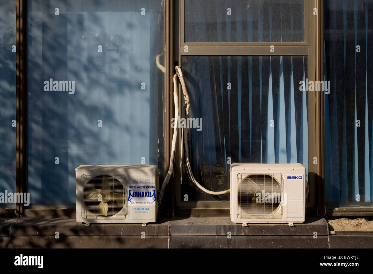 Air conditioning units on a wall of the Palace of Youth and Sport in Pristine, Kosovo Stock Photo