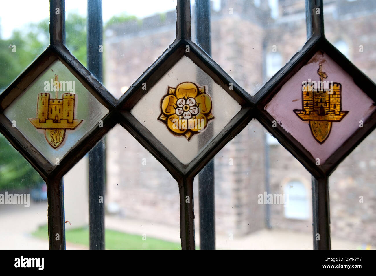 Stained glass in Clitheroe a small town in Northern England with a small Norman Castle Keep in parkland in the centre of town Stock Photo