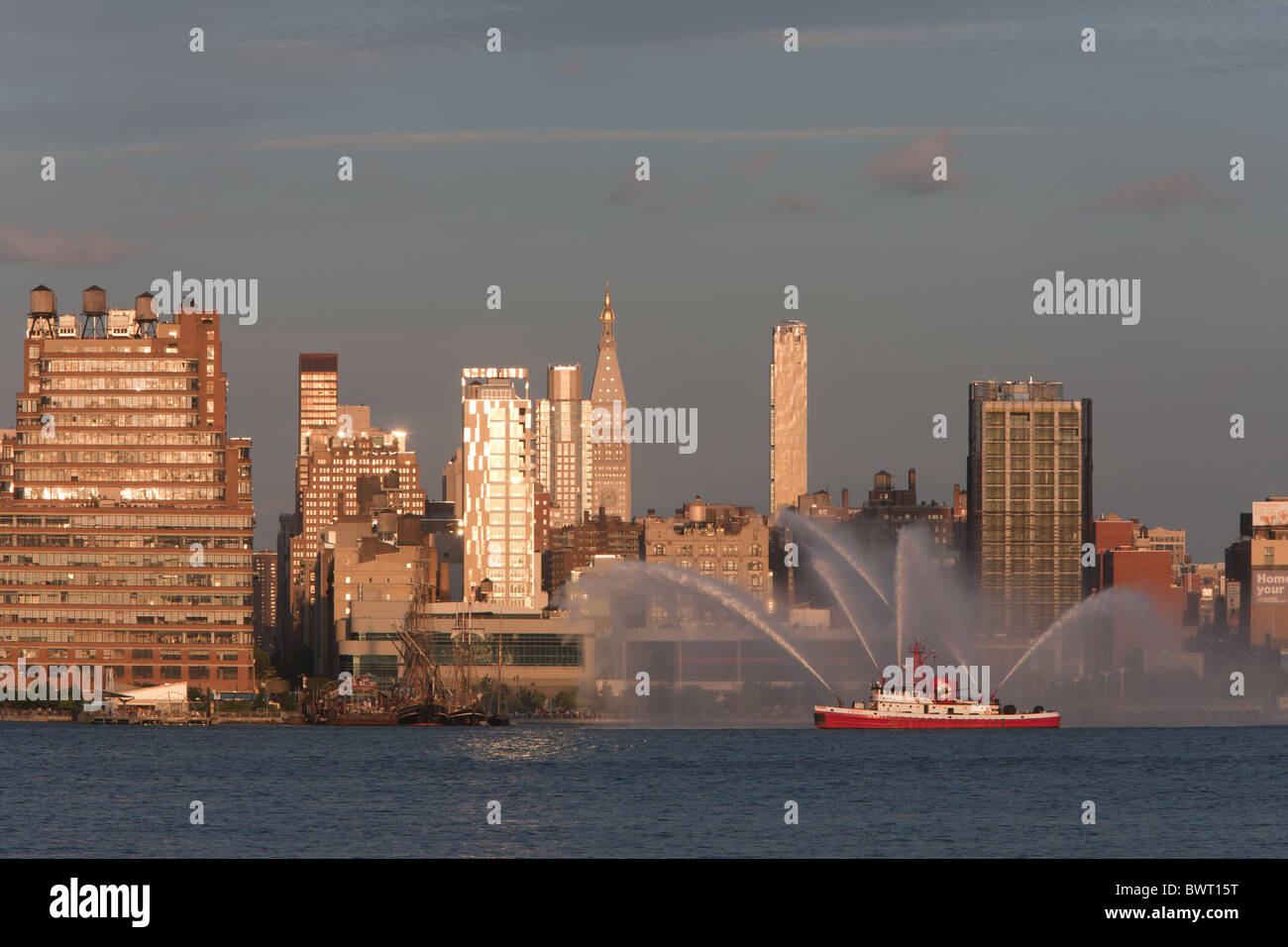 FDNY Marine 1 fire boat 'John D. McKean' puts on a water show on the Hudson River on Independence Day. Stock Photo