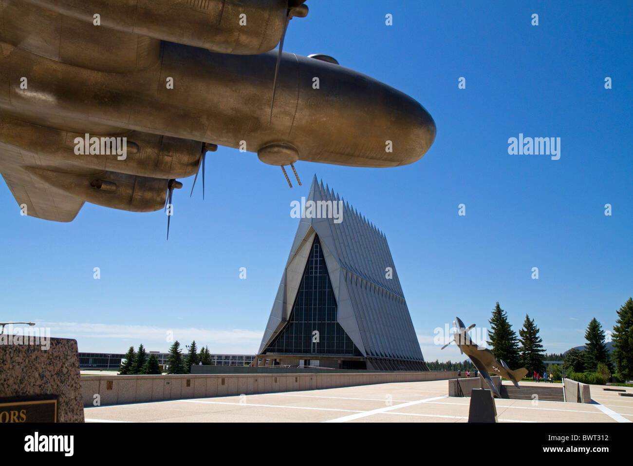 Bronze sculpture of vintage WW11 aircraft in front of the Cadet Chapel at the Air Force Academy, Colorado Springs, Colorado, USA Stock Photo