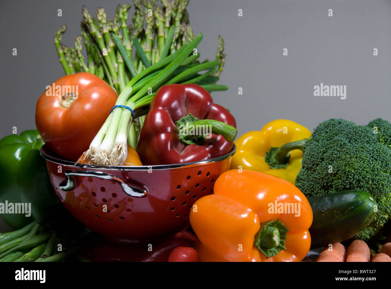 Fresh vegetables in colander Stock Photo Alamy