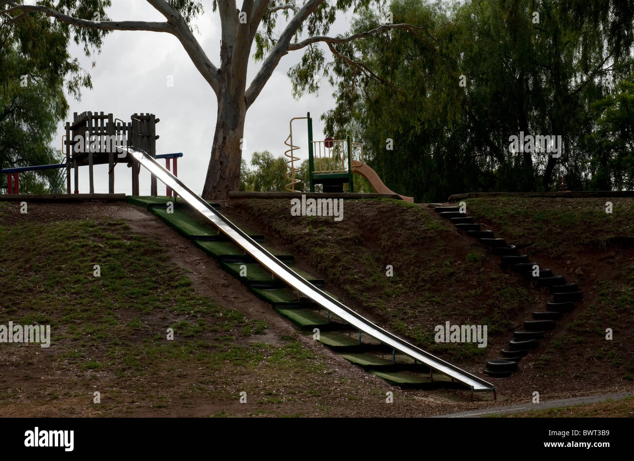 Australian playground slippery dip slide hires stock photography and