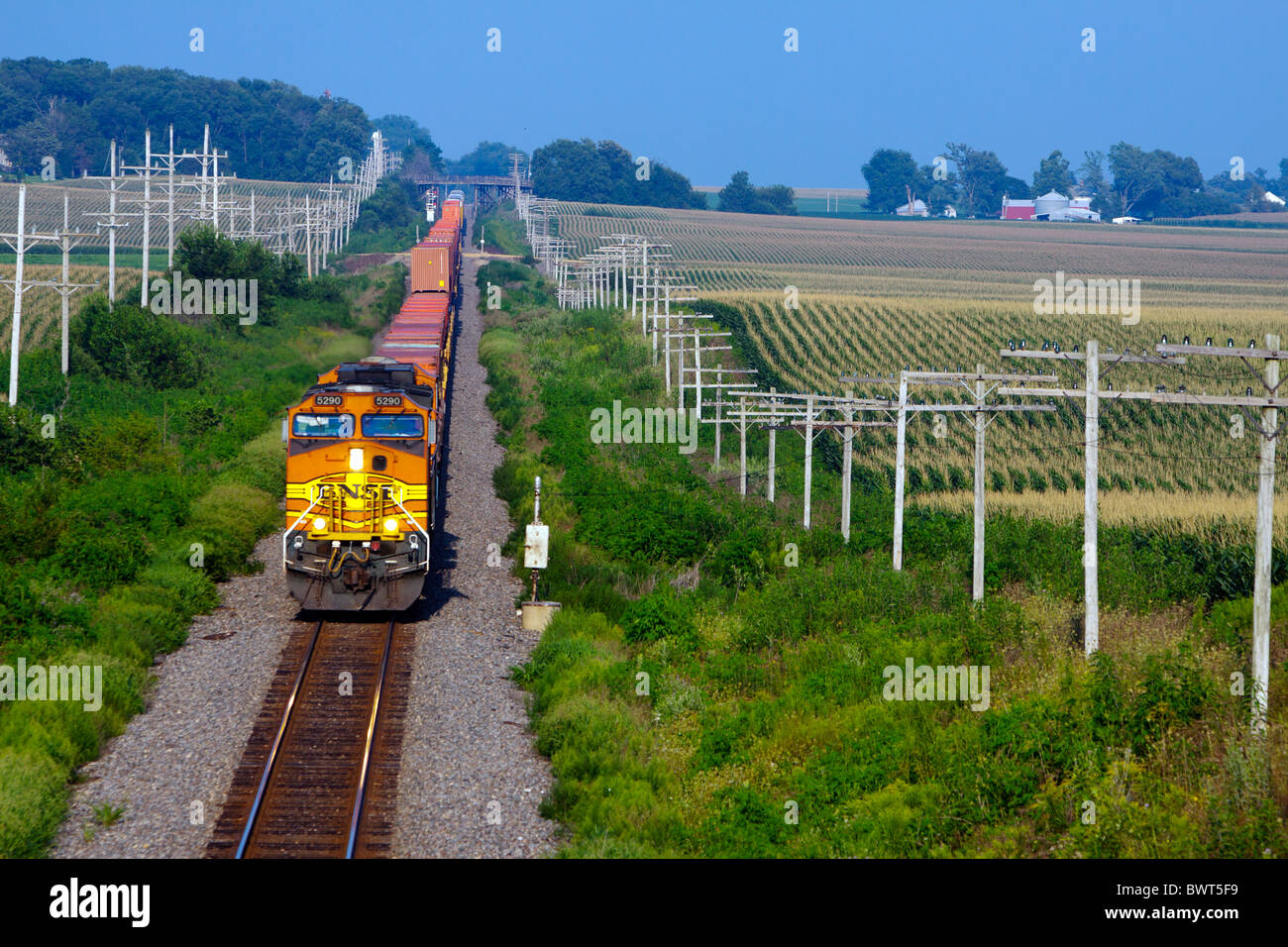 BNSF freight train rolling on the plains of northern Illinois. Stock Photo