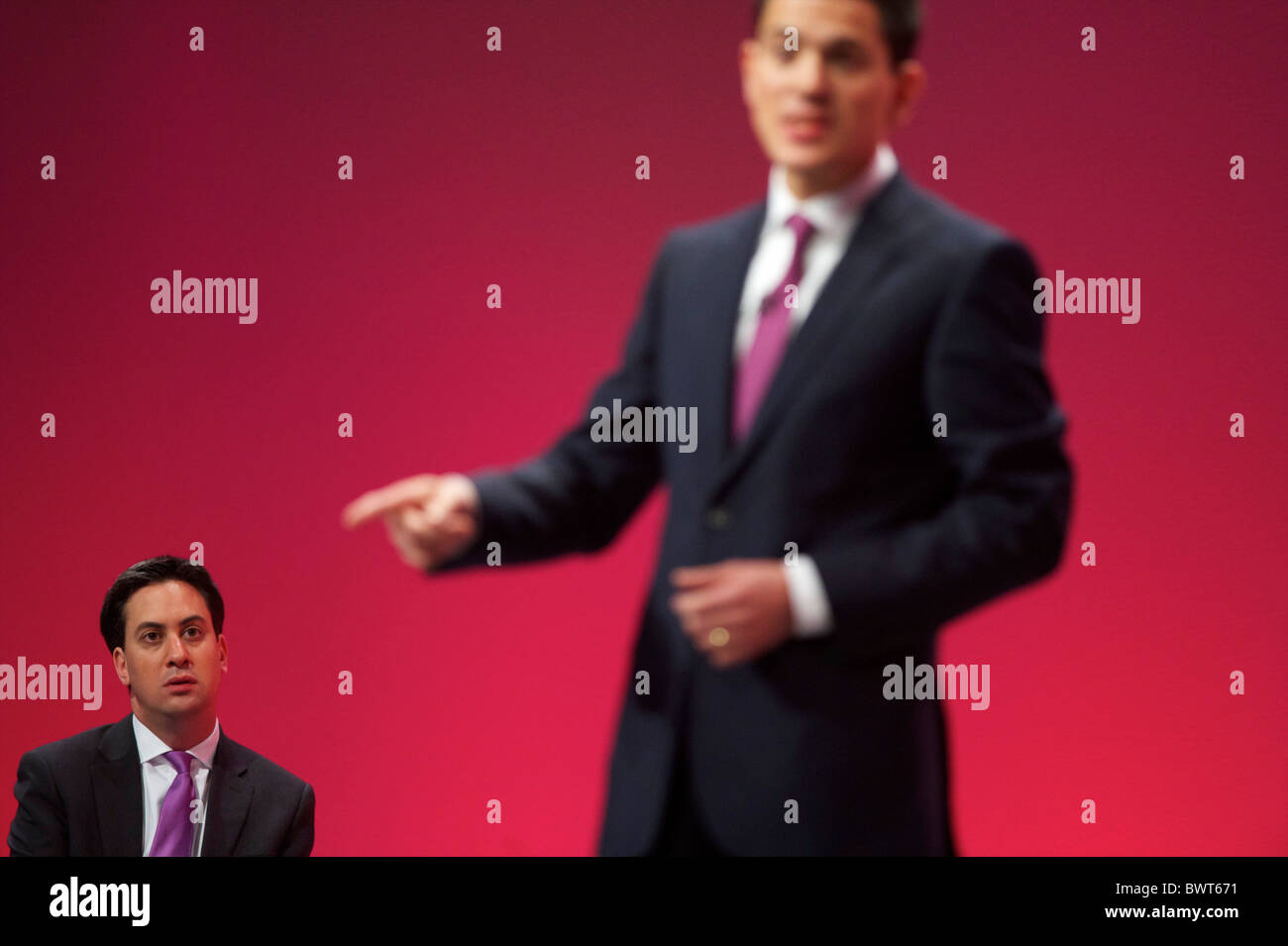 As Newly Elected Labour Leader And Younger Brother Ed Miliband Looks as-newly-elected-labour-leader-and-younger-brother-ed-miliband-looks