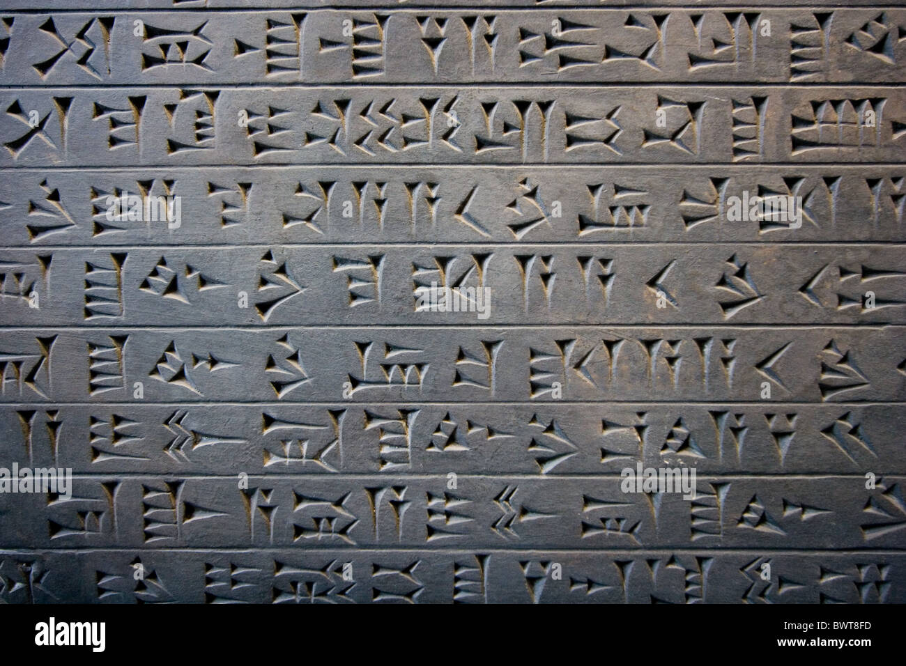 Ancient Persian written relief from Darius palace, the Louvre, Paris Stock Photo
