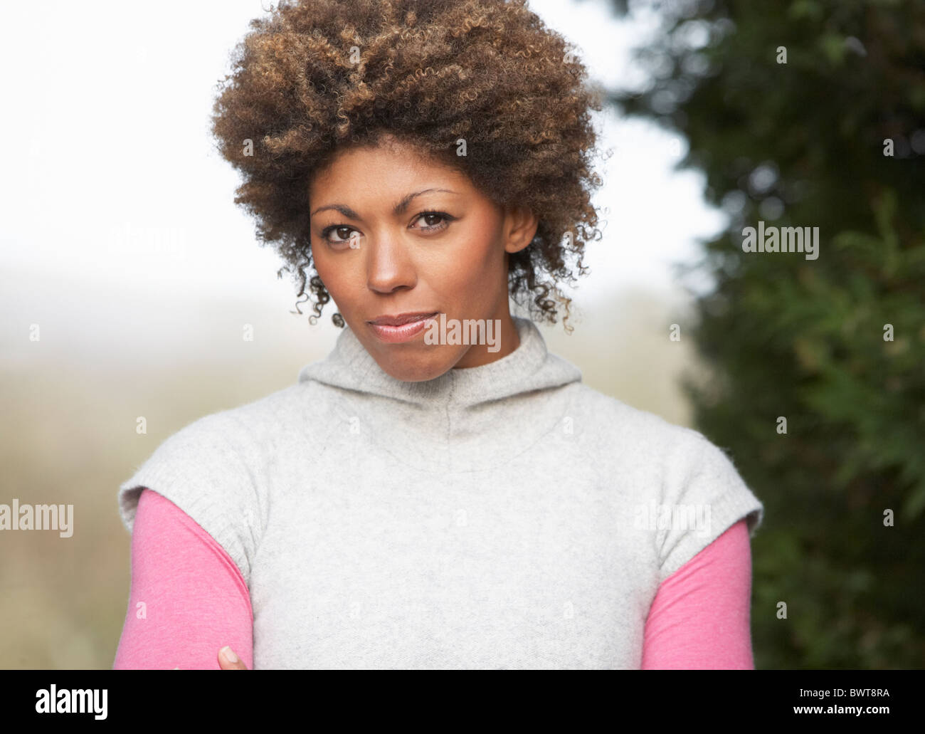 Portrait Of Beautiful Woman In Garden Stock Photo - Alamy