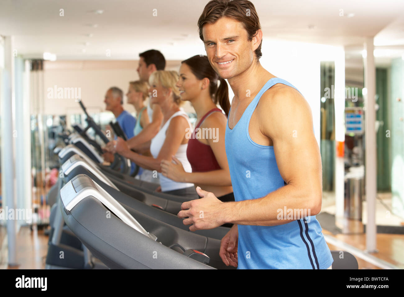 Man On Running Machine In Gym Stock Photo Alamy