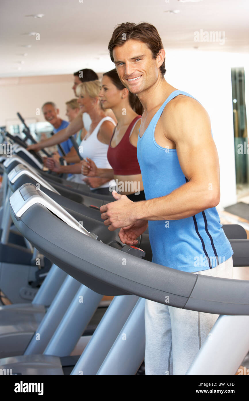 Man On Running Machine In Gym Stock Photo Alamy