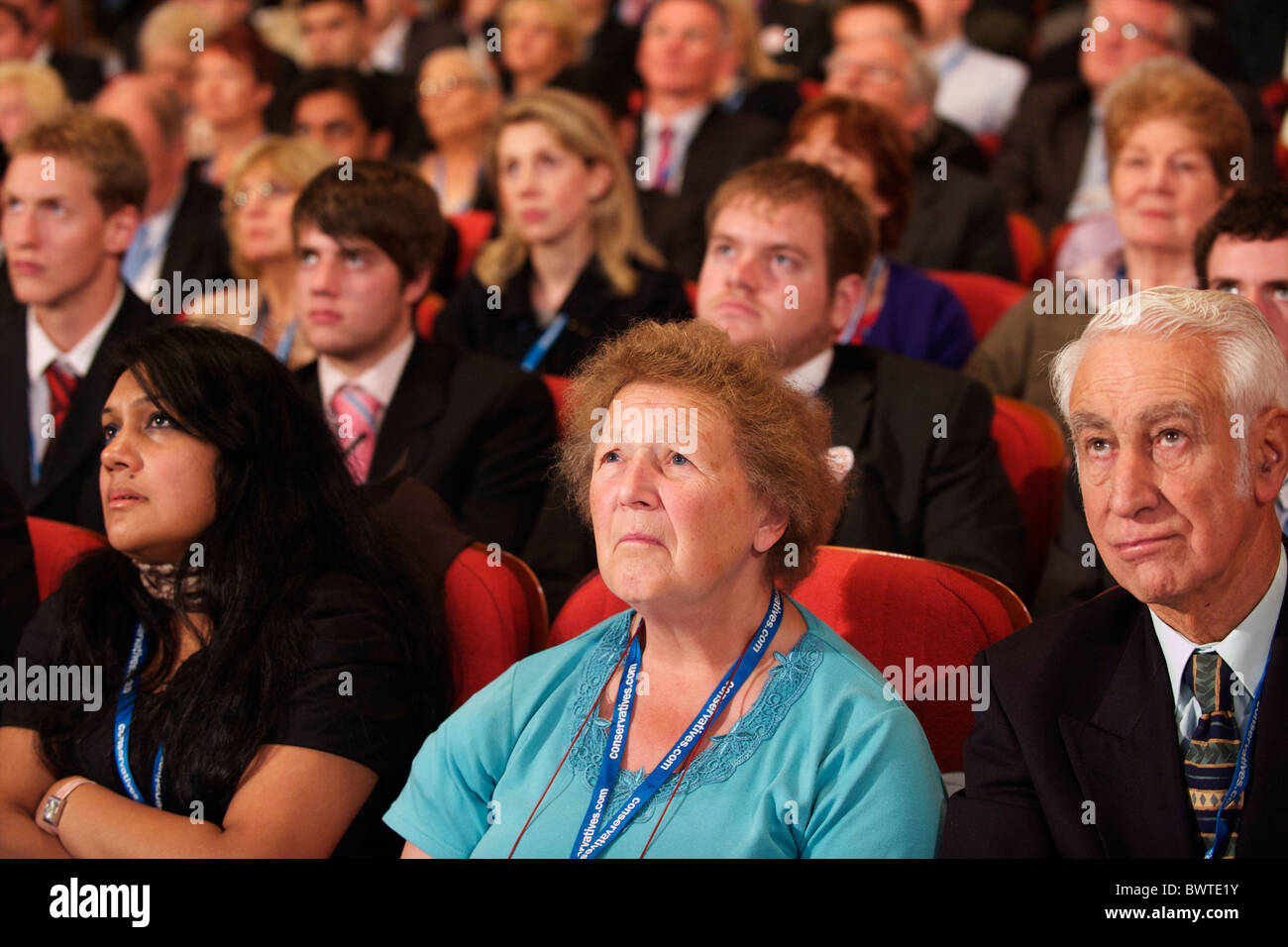 Delegates listen to speeches on the second day of the Conservatives Party Conference at the ICC, Birmingham, UK on October 4, Stock Photo