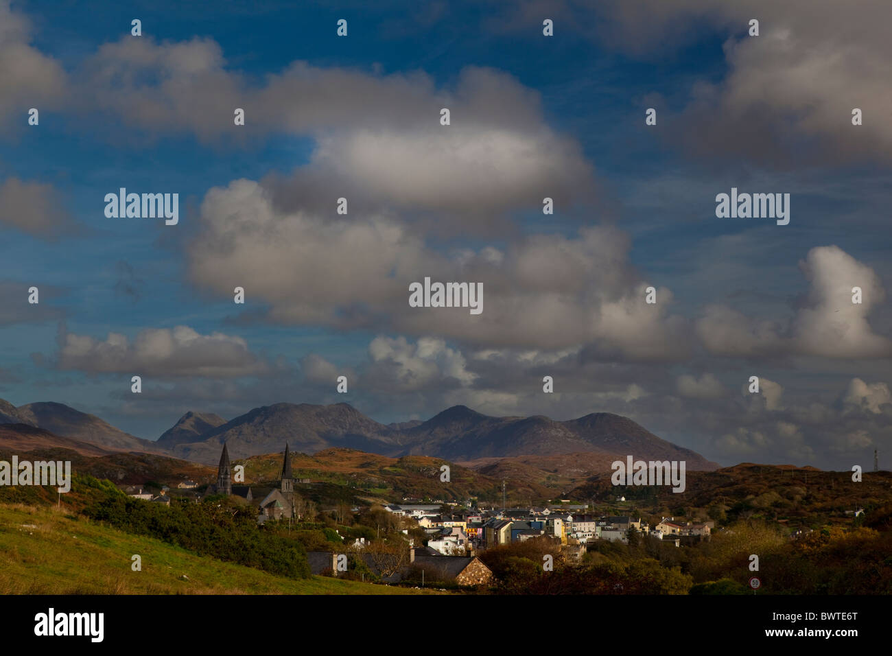 View of the Connemara town of Clifden, in Ireland, with the Twelve Bens mountains in the background Stock Photo