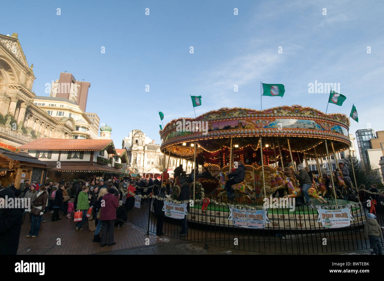 carousel ride horses in Birmingham city center funfair rides uk city cities town Stock Photo Alamy