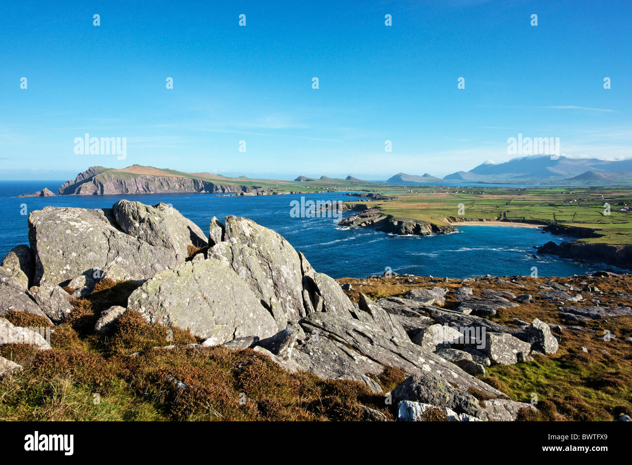 View from Clogher Head towards Sybil Point and The Three Sisters above Smerwick, Dingle Peninsula, County Kerry, Ireland Stock Photo