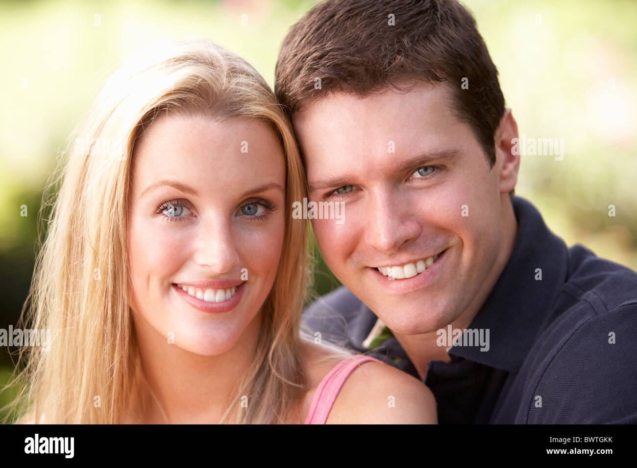 Portrait, Young Woman Relaxing In Park Stock Photo - Alamy