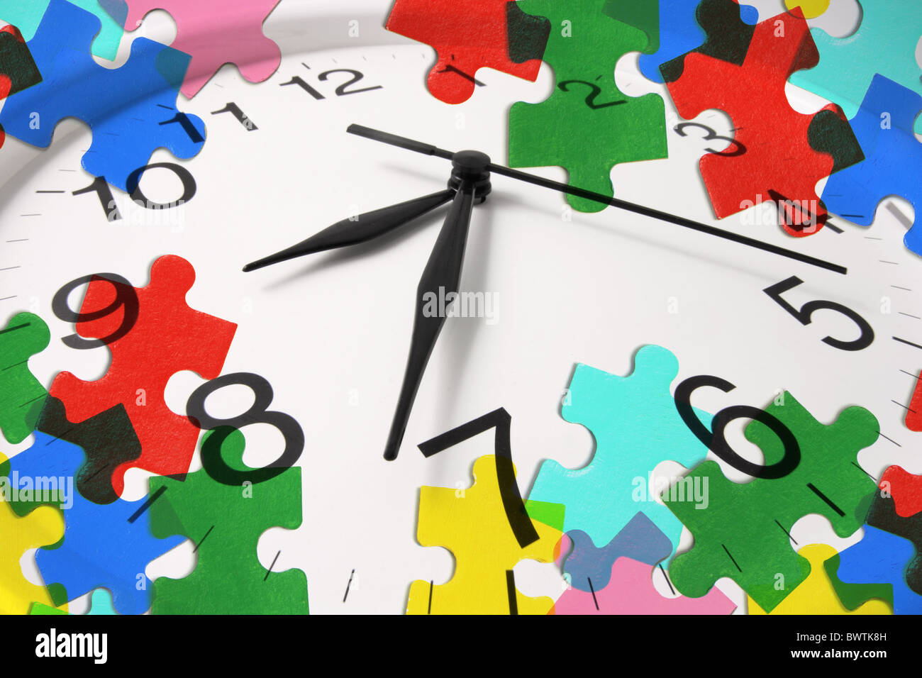 Clock and Jigsaw Puzzle Pieces Stock Photo Alamy