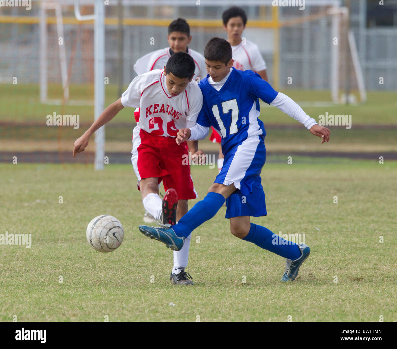 Seventh and eighth grade boys ages 13 and 14 play soccer for their ...