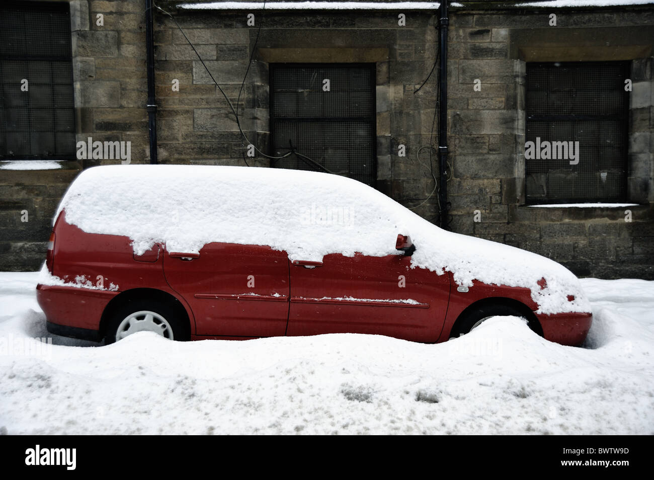 Snow covered car Stock Photo