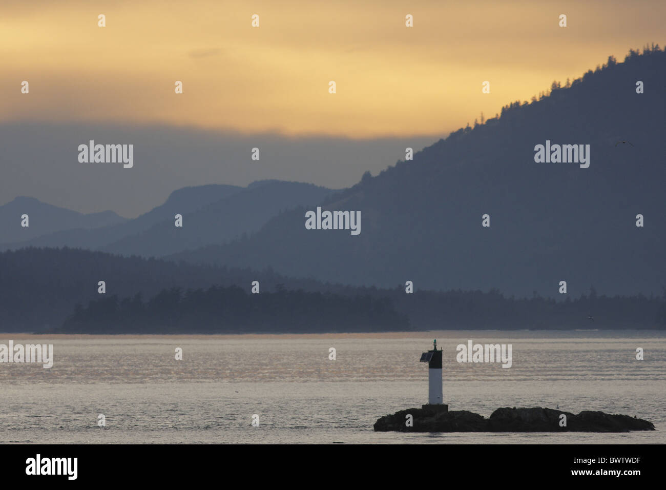 View coastline with unmanned lighthouse island Stock Photo