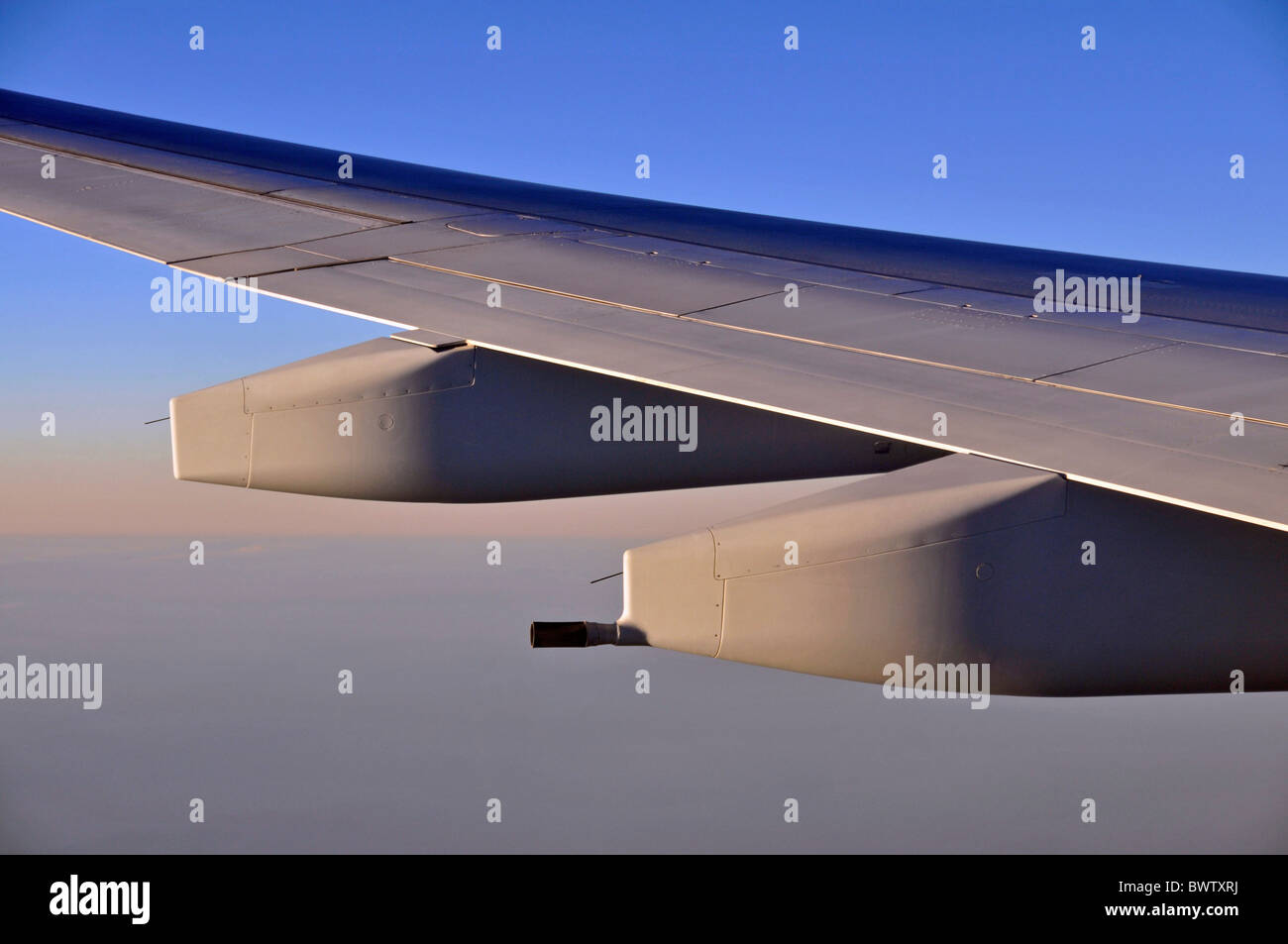 Airplane wing logo Emirates airplane travel winglet wingtip aviation jet air liner tourism Arabia United A Stock Photo