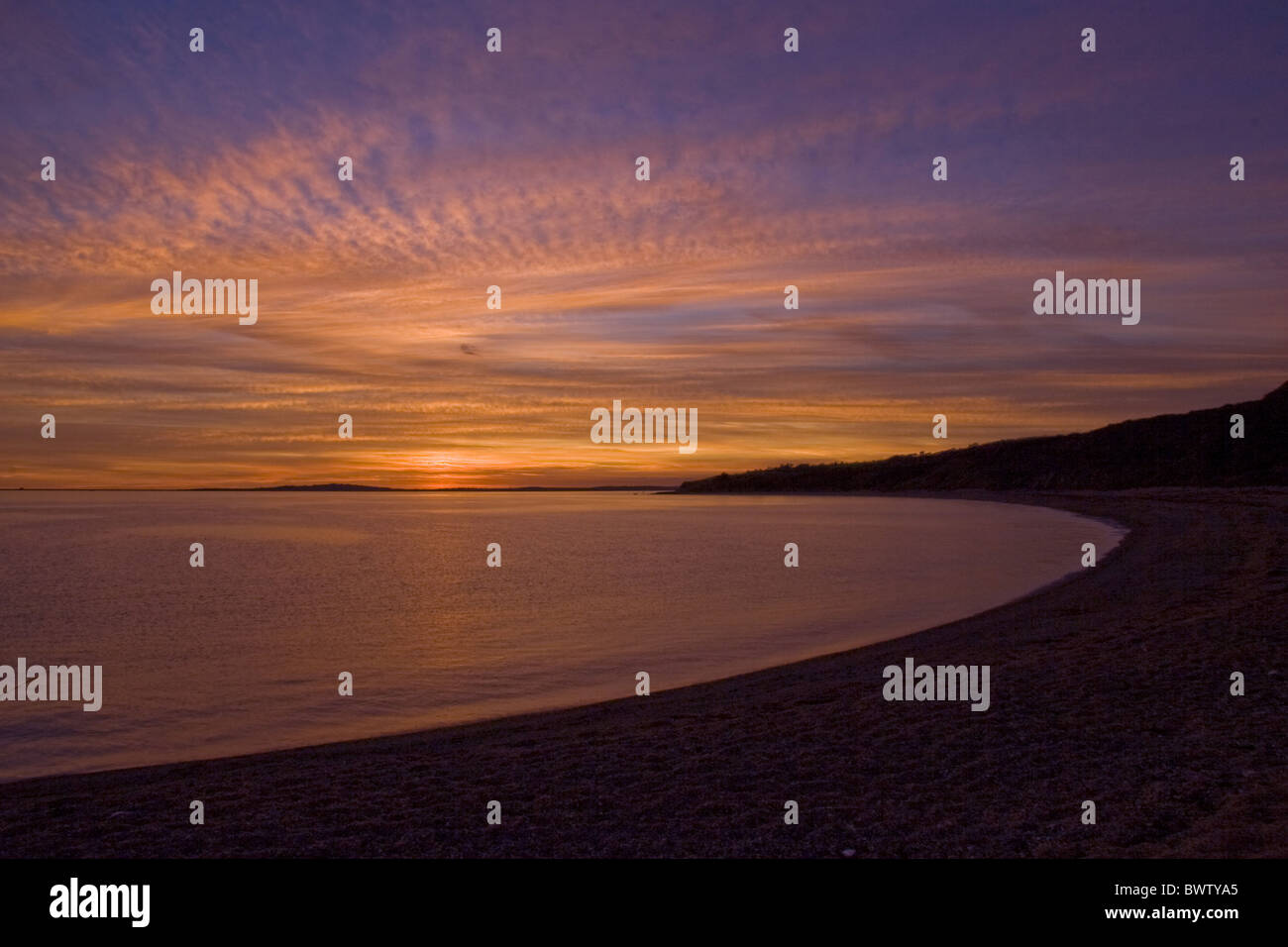 sunset colour colours reflections reflection cloud clouds cirrus Dorset England English Europe European high level cloud Stock Photo