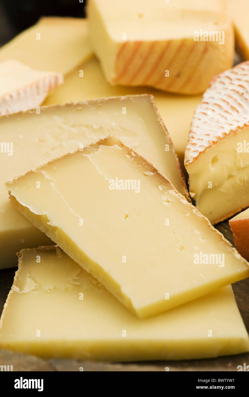 Mountain cheese collection as closeup on a chopping board Stock Photo