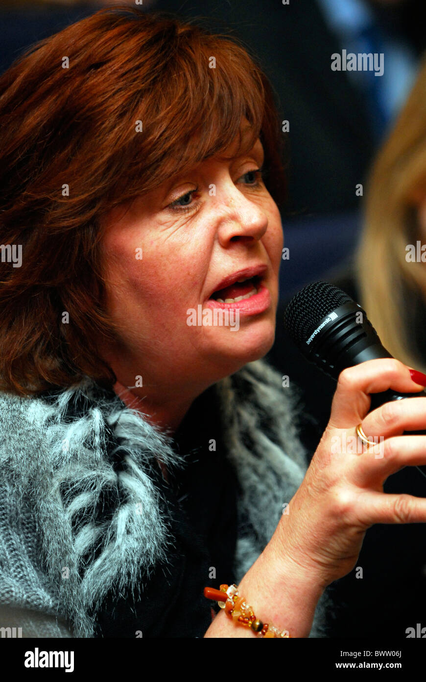 Female delegate public speaking at a conference about caring for dependents, November 2010, London, UK. Stock Photo