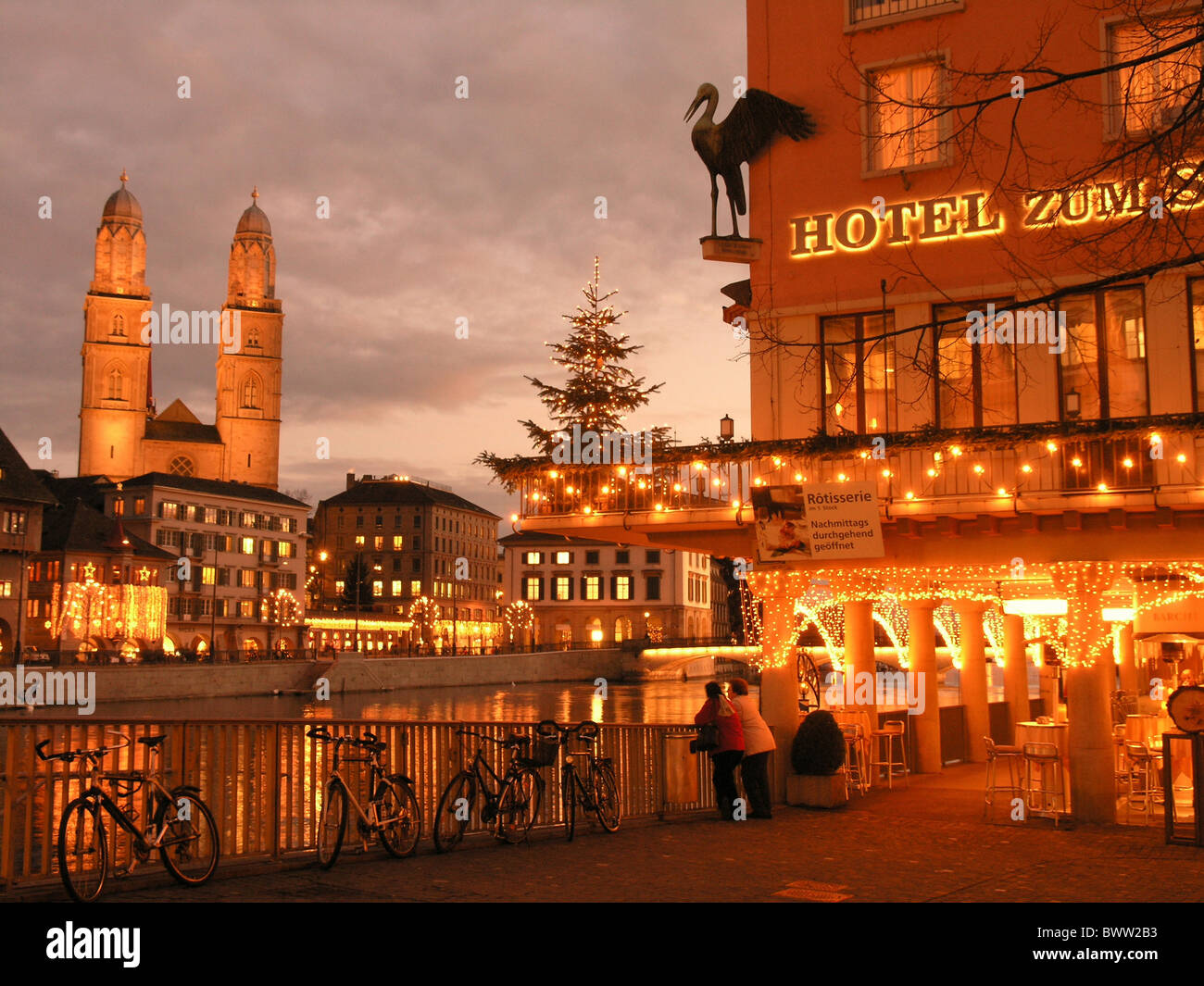 Switzerland Europe Zurich city town Zurich christmas people lights illumination illuminated dusk evening m Stock Photo