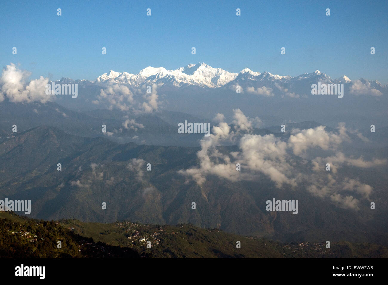 Early morning sun on the peaks of Mount Kanchenjunga, at  8,595-m the world's third highest mountain Stock Photo