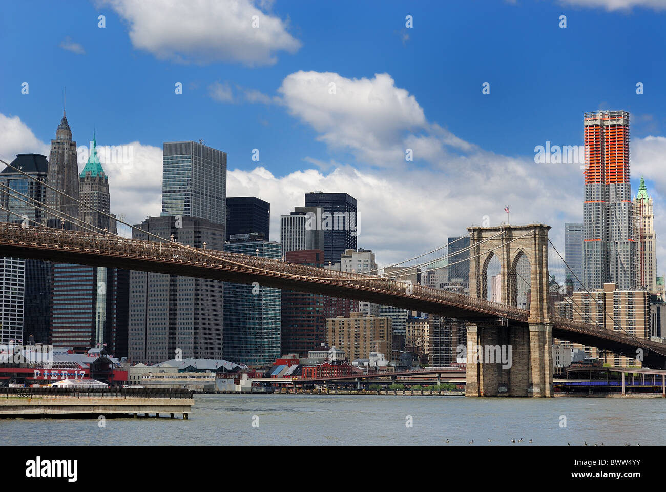 Brooklyn Bridge and Manhattan Skyline from across the East River Stock ...