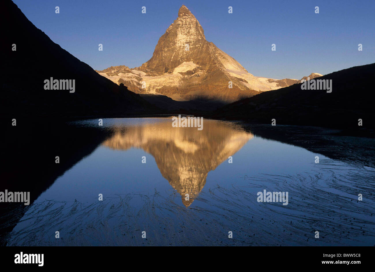 Switzerland Europe Canton Valais Matter valley Matterhorn Lake Riffel mountain lake water reflections mountai Stock Photo