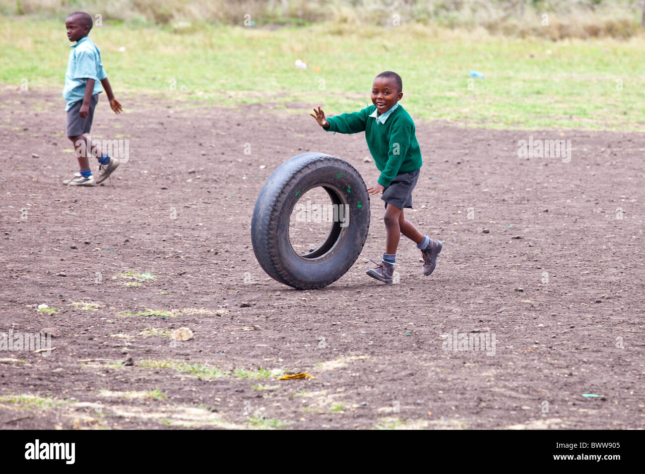 Boy Rolling Tire High Resolution Stock Photography and Images Alamy