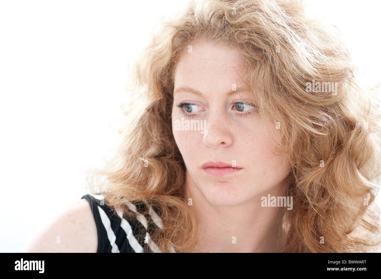 beautiful woman in deep thought Stock Photo