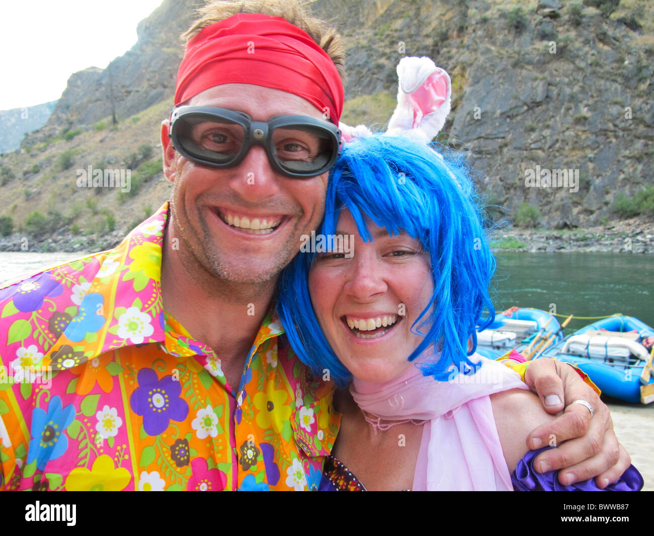 USA, Idaho, Rafting, Middle Fork of the Salmon River, Man and Woman river Guides dressed up in humorous costumes. Stock Photo