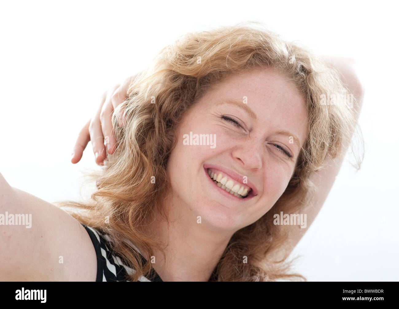 Studio headshot of a cheerful woman Stock Photo