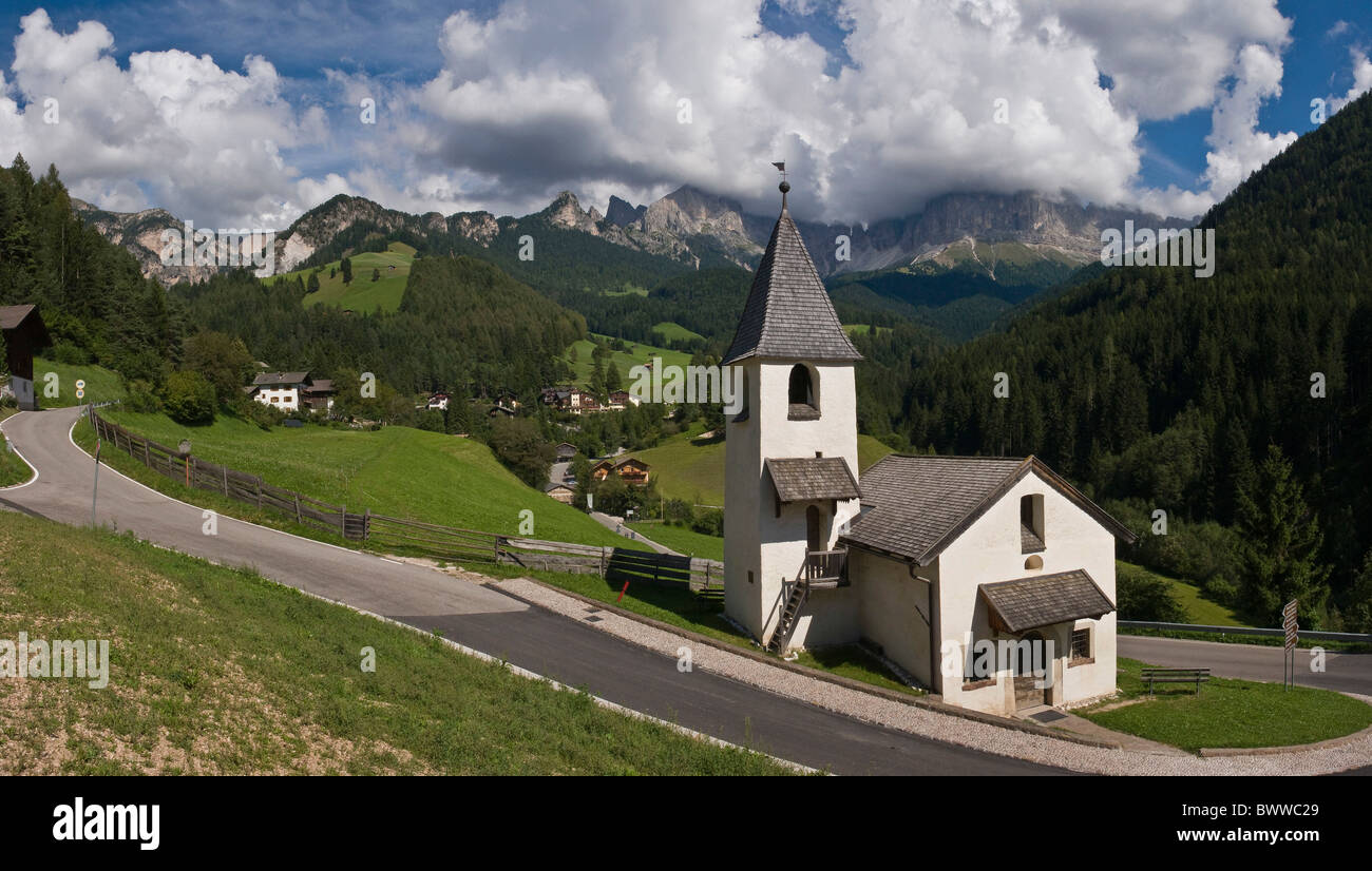 Italy Europe St. Cyprian town Tiers South Tyrol South Tirol Alto Adige church Rosengarten clouds Dolomites Stock Photo