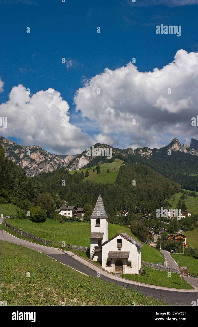 Italy Europe St. Cyprian town Tiers South Tyrol South Tirol Alto Adige church Rosengarten clouds Dolomites Stock Photo
