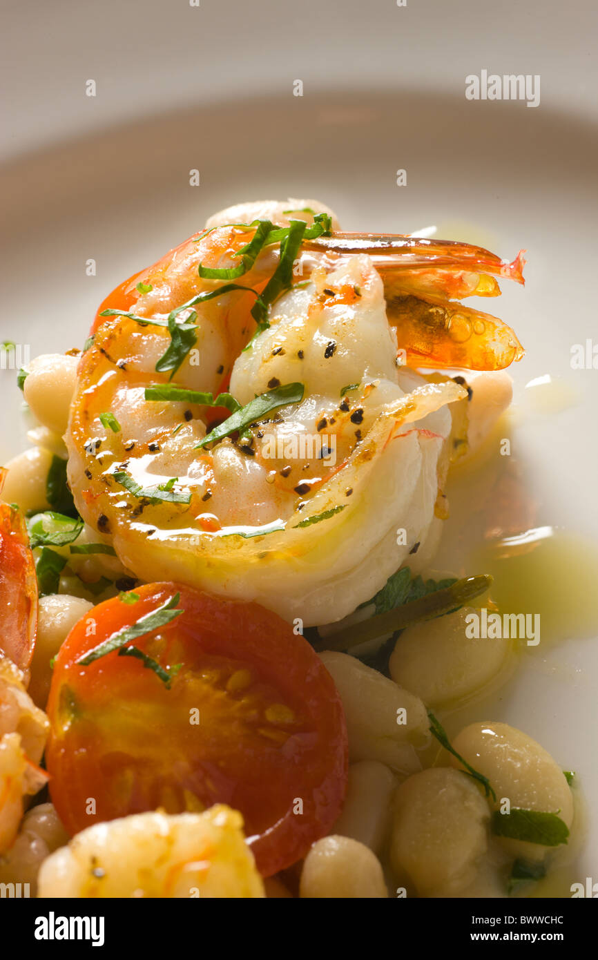 Warm Shrimp and White Beans with Tomato and Parsley Stock Photo