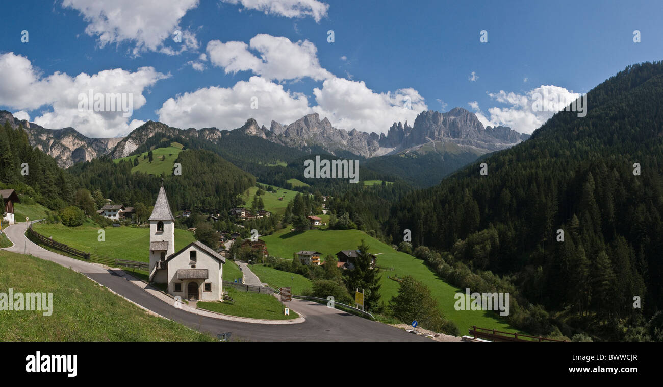 Italy Europe St Cyprian town Tiers South Tyrol South Tirol Alto Adige summer mountains alps Landscape scen Stock Photo