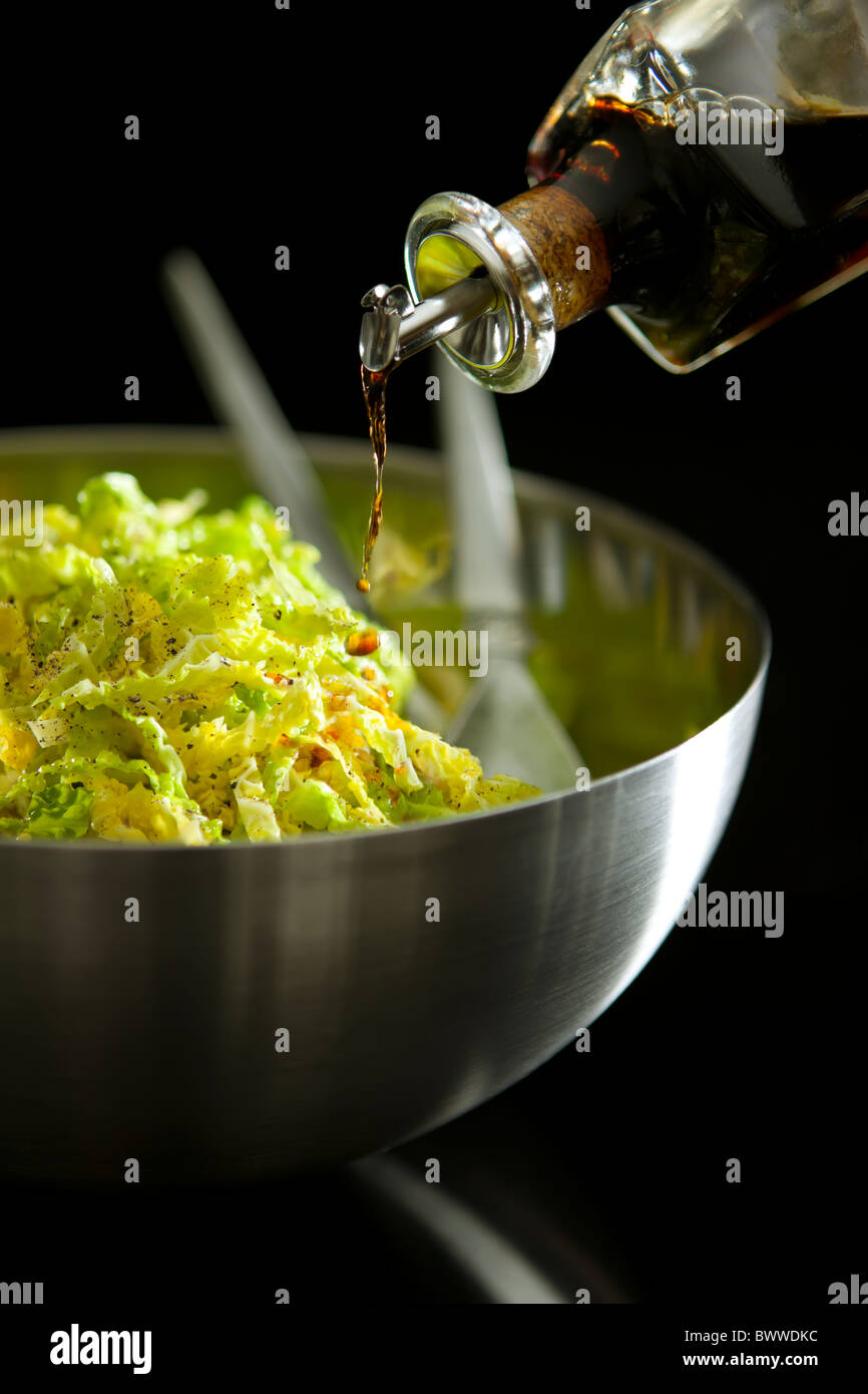 Shredded Savoy Cabbage with Black Pepper, olive oil and Sherry Vinegar Stock Photo