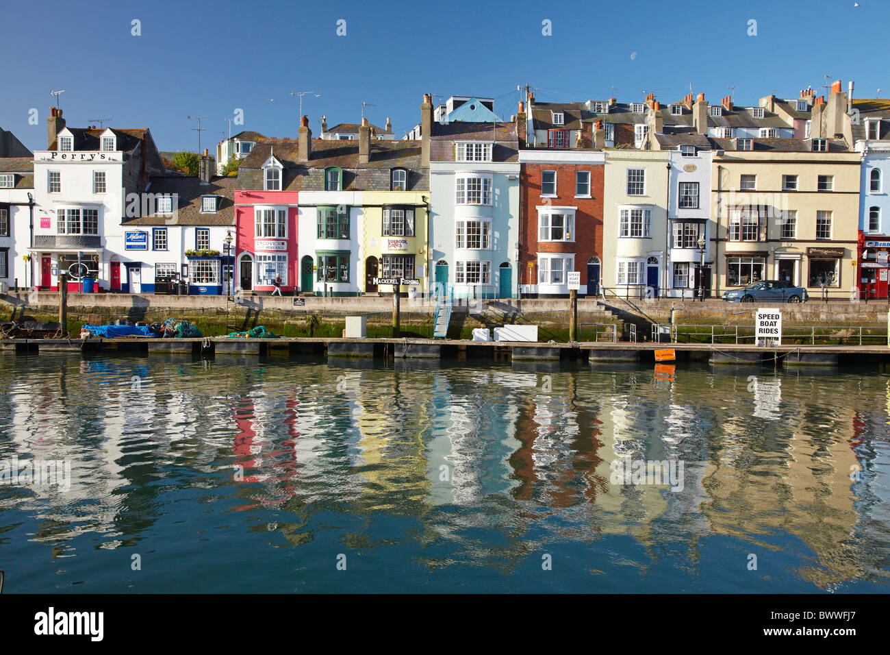 Buildings reflected in Weymouth Harbour, Weymouth, Dorset, England