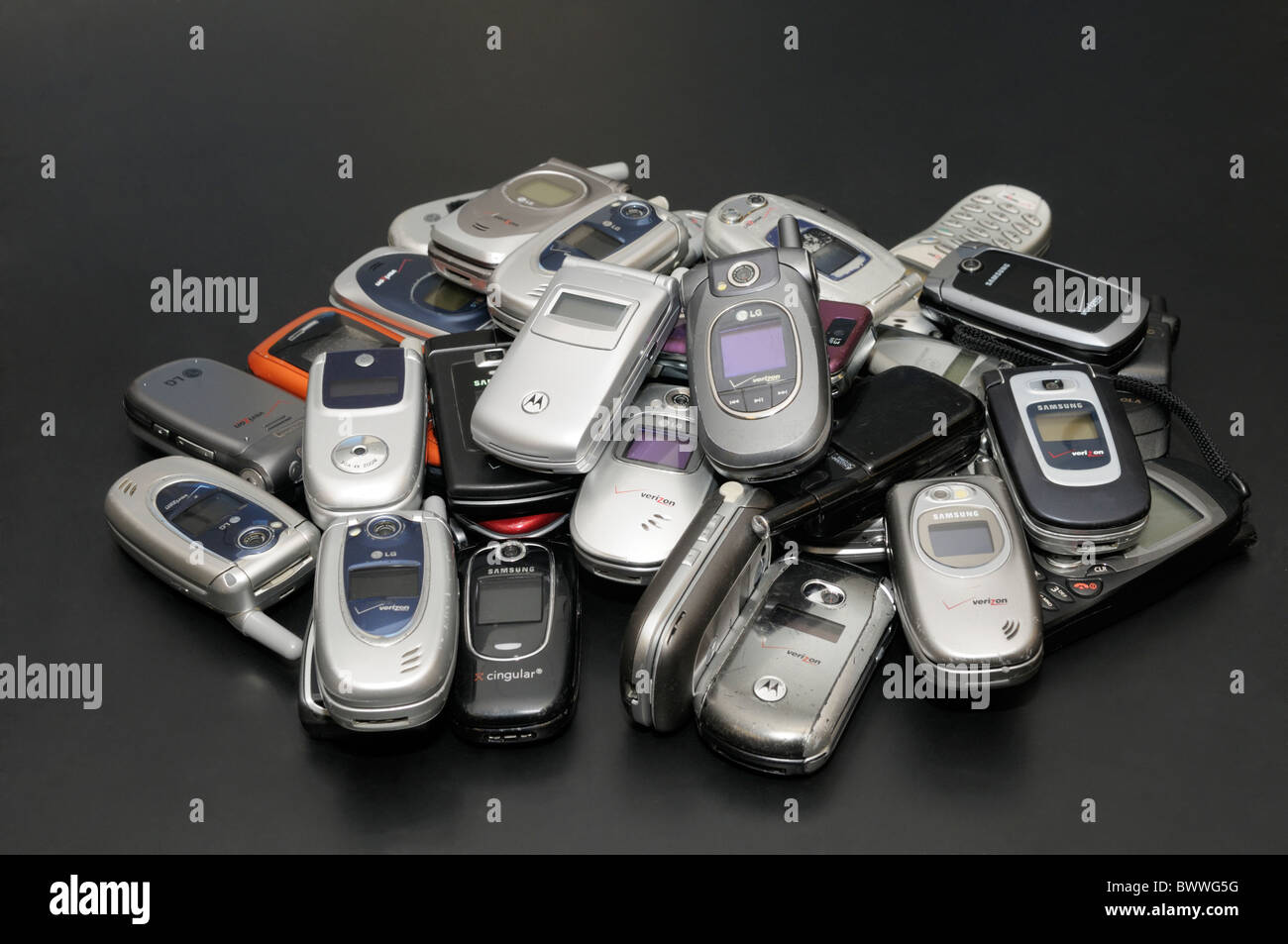 Used cell phones collected to be shipped for recycling Stock Photo