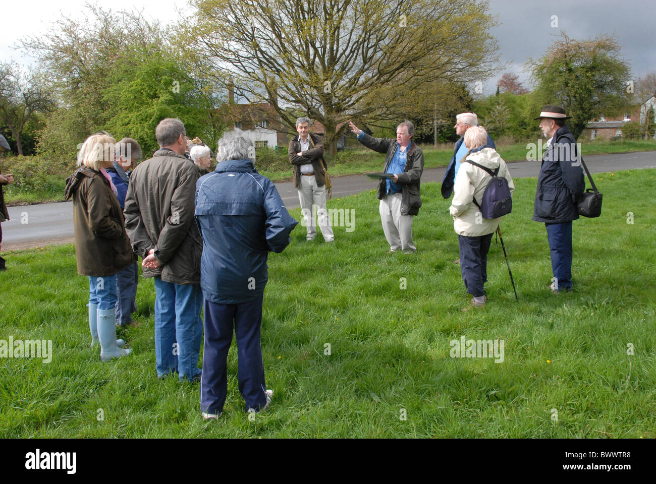 Members of public on historical walk, organised by Chiltern Conservation Board, Cholesbury Common, Chilterns, Buckinghamshire, Stock Photo