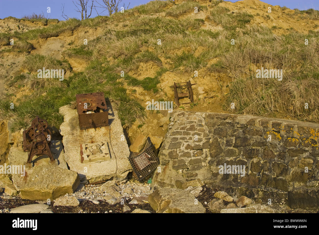 Beach beaches Coast Coasts Coastal Gear Jurassic Cliff Cliffs Rock Rocks Rocky Geology Geological Geologic Pile Piles Piled Stock Photo