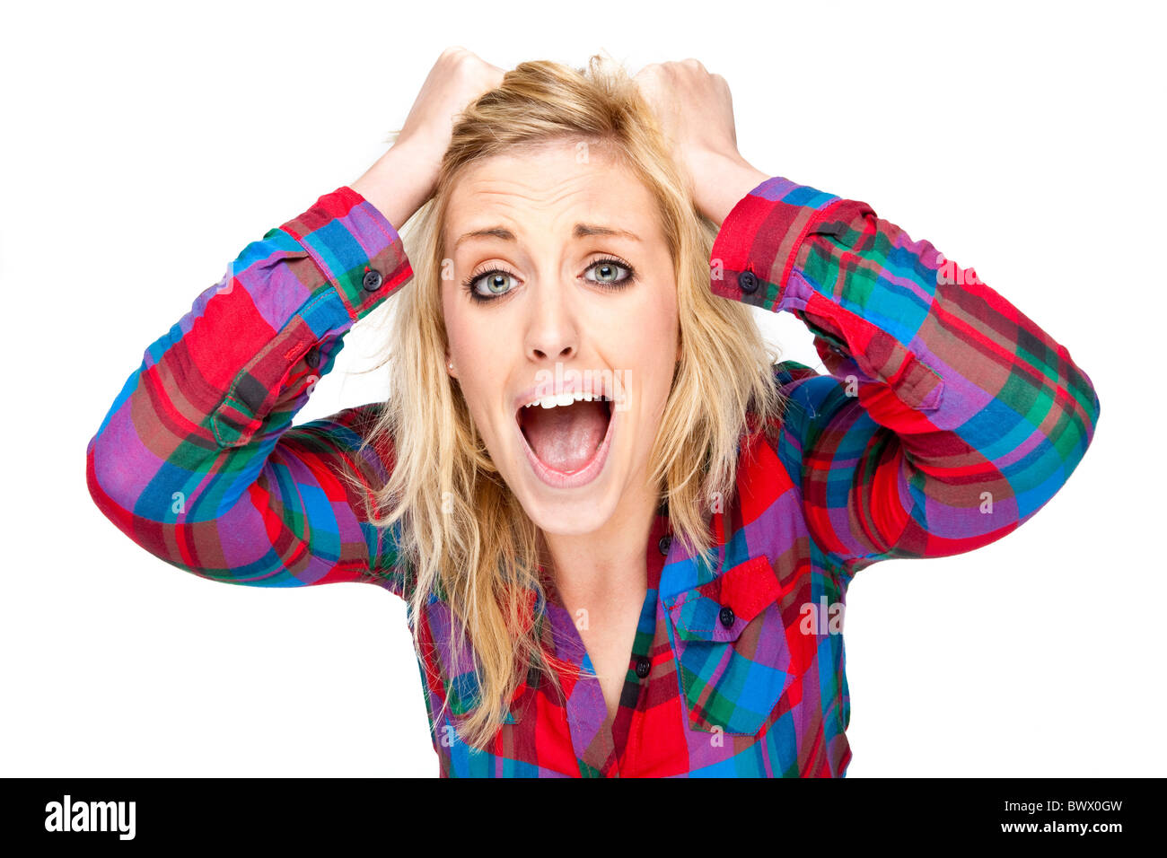 Woman screaming pulling hair out hires stock photography and images