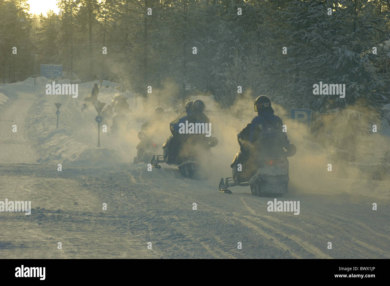 Fumes from snowmobiles snow Yllas Lapland Finland Stock Photo